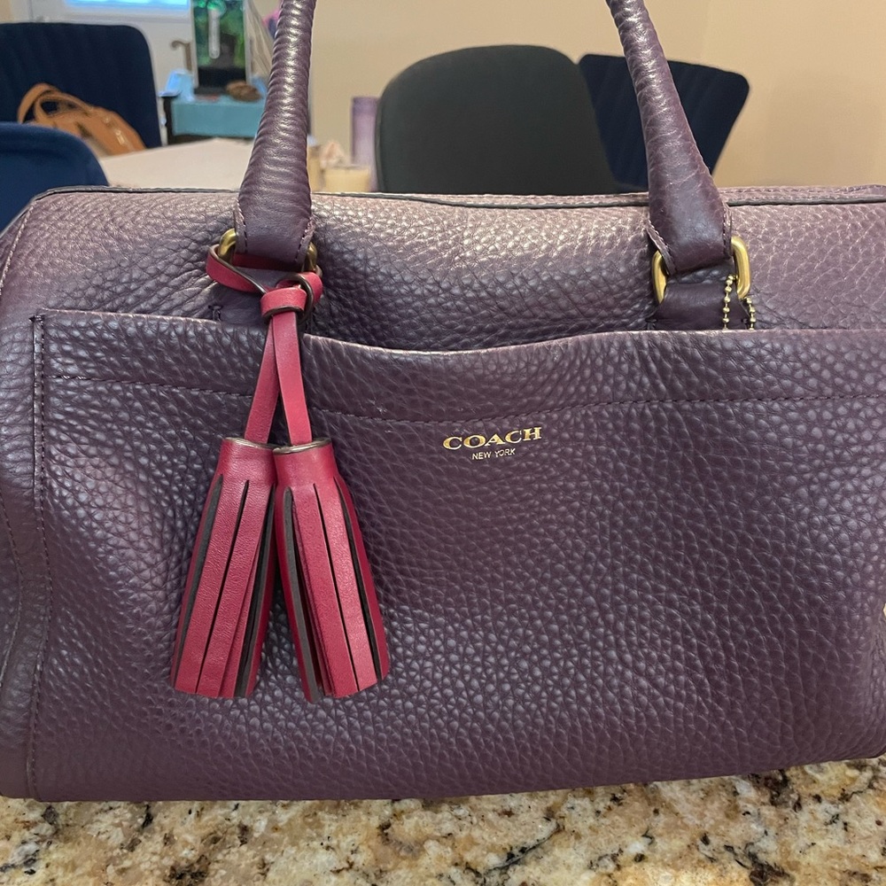 Dark purple Coach Bowler bag.